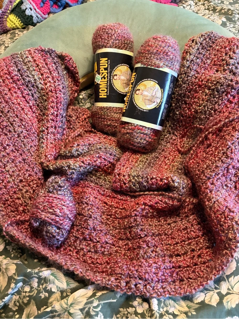 Homespun Variegated Pink Lavender Crochet Throw with Yarn bundle in Great Plains